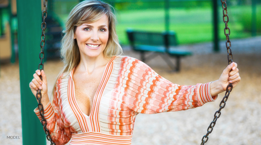 Woman with stripped shirt in the park